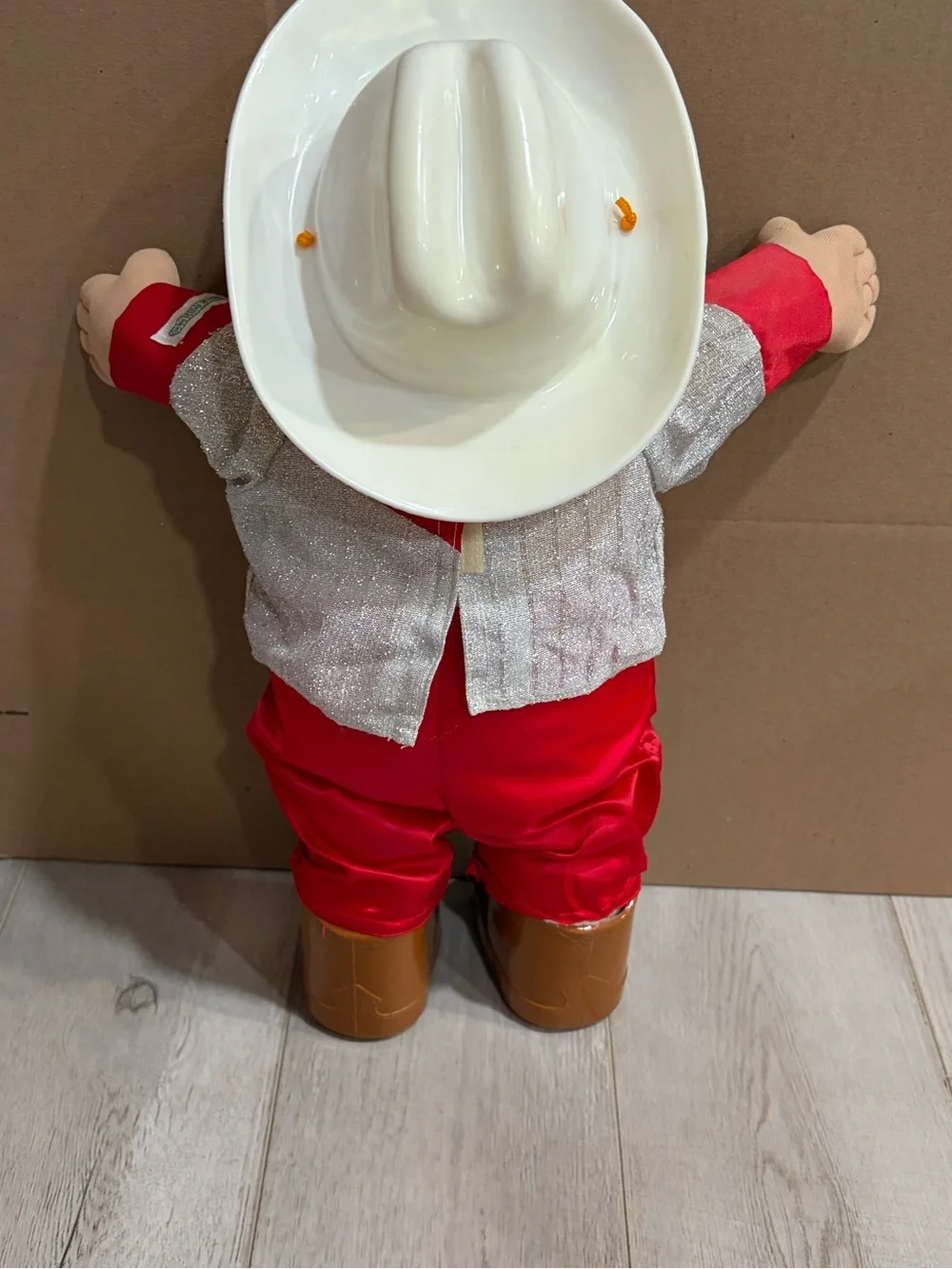 cabbage patch kids wearing a cowboy outfit with cowboy hat
